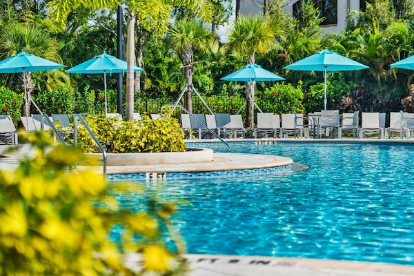 3 outdoor pools, open 9:00 AM to 10:30 PM, pool umbrellas, sun loungers