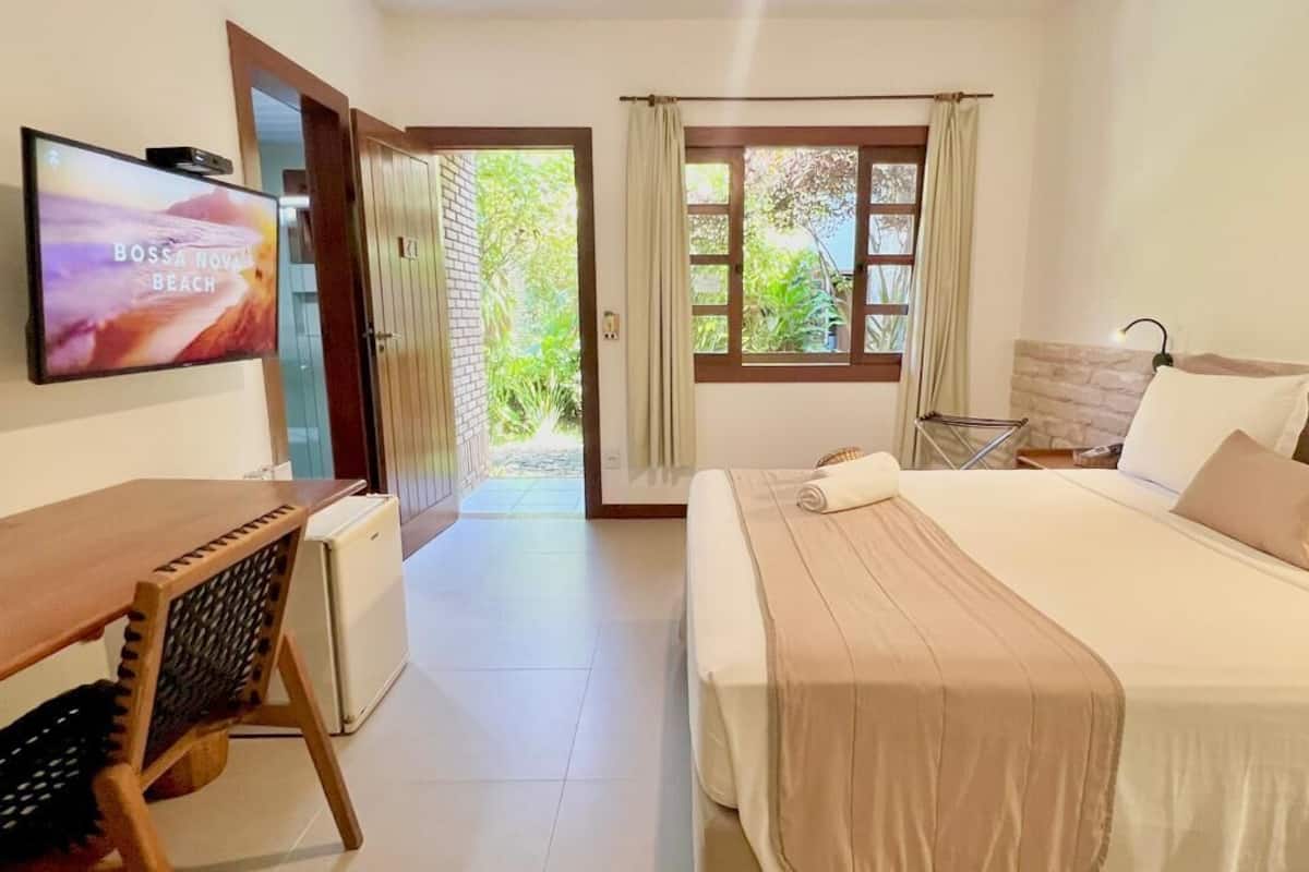 Standard Room, Ground Floor | 1 bedroom, minibar, individually decorated, individually furnished
