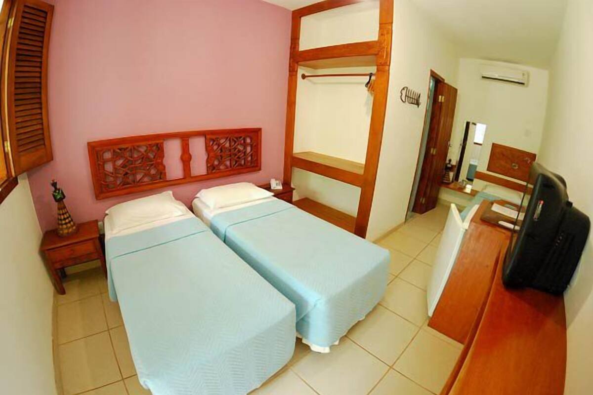 Habitación triple | Minibar, wifi gratis y ropa de cama