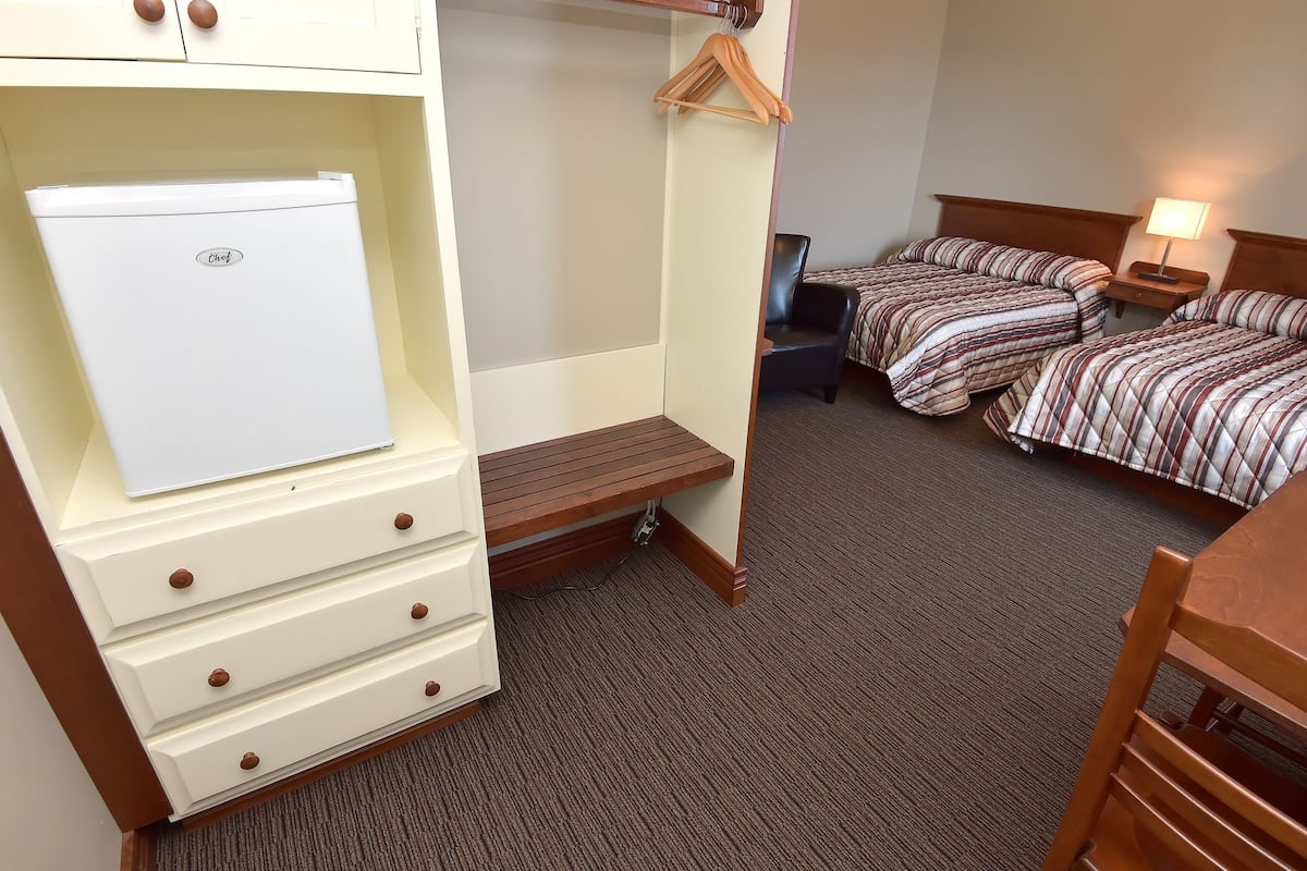 Desk, laptop workspace, blackout curtains, free WiFi