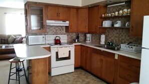 Standard House, 3 Bedrooms | Private kitchen | Full-sized fridge, microwave, stovetop, coffee/tea maker - The Estela House (Indianapolis)