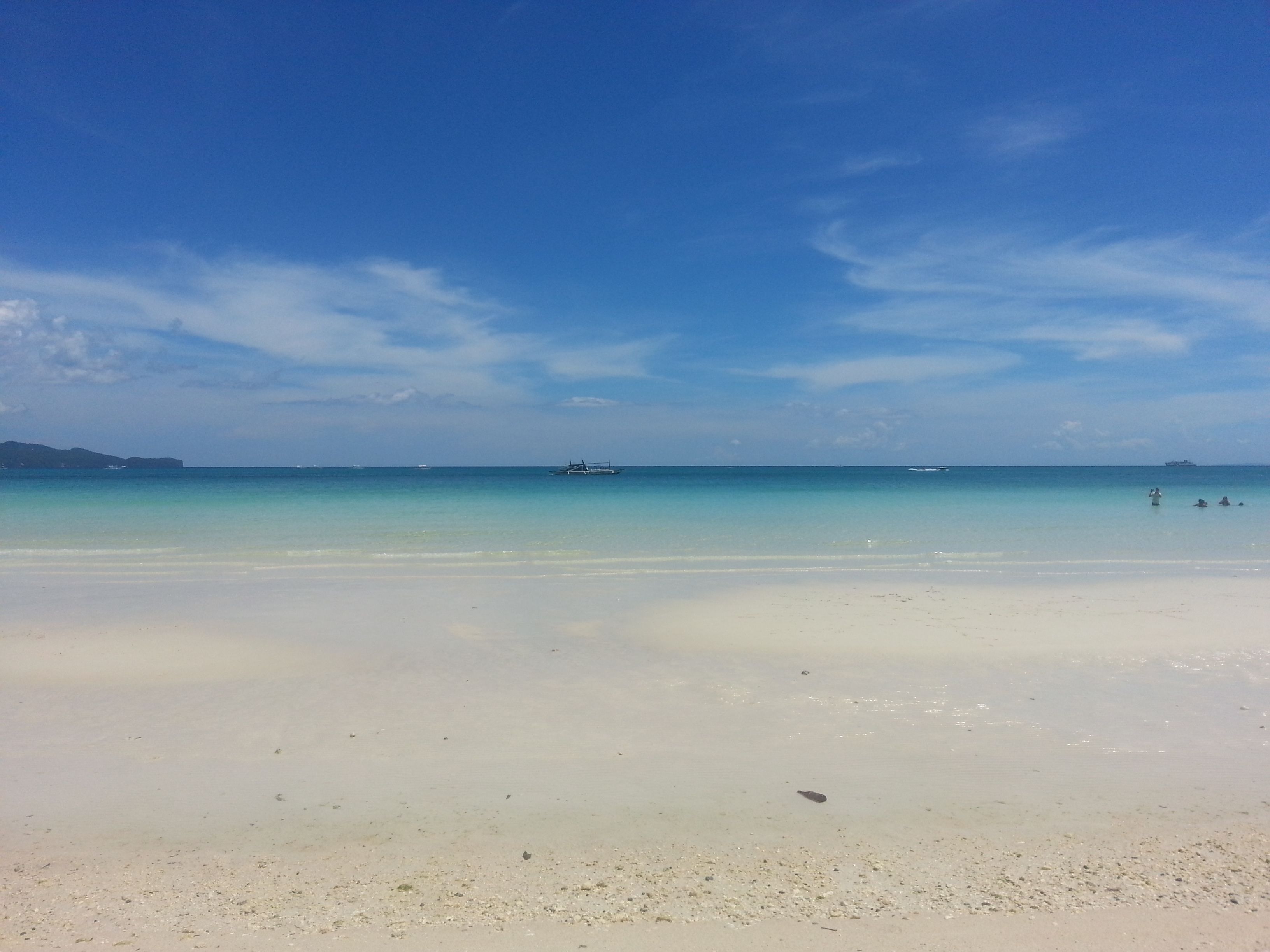 on the beach, white sand, 3 beach bars