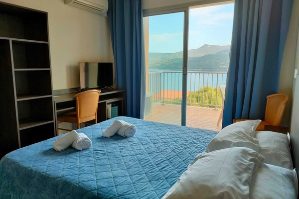 Double Room, Sea View | Desk, rollaway beds (surcharge), bed sheets