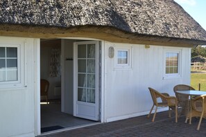 Large Comfort Cabin, Private Bathroom (with Loft Bed - Linnen Excluded) | Terrace/patio