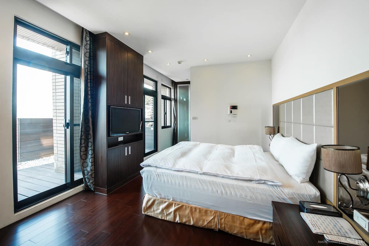 Deluxe appartement, uitzicht op stad | Luxe beddengoed, individueel gedecoreerd, individueel gemeubileerd