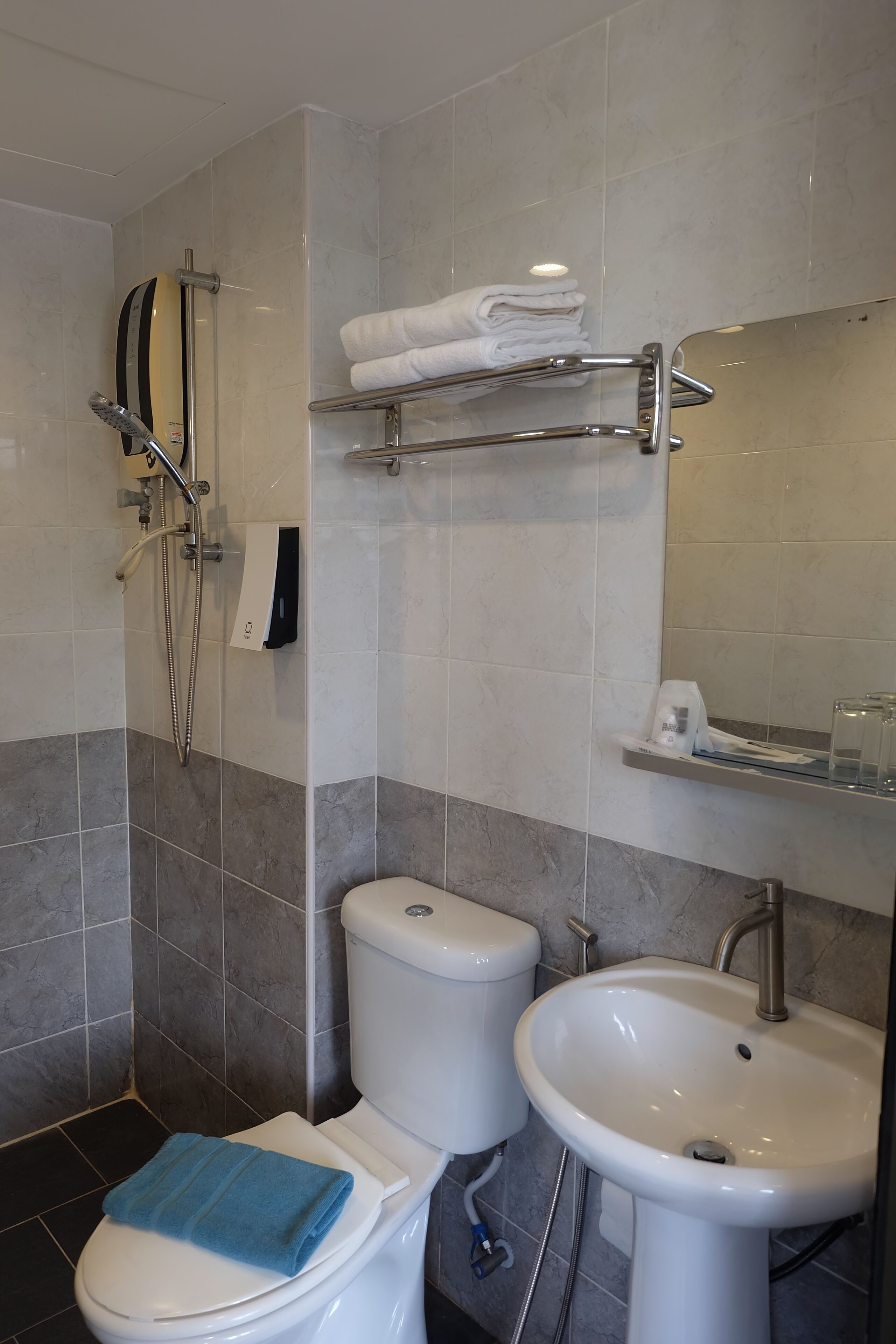 superior room | bathroom | shower, eco-friendly toiletries, hair dryer, slippers