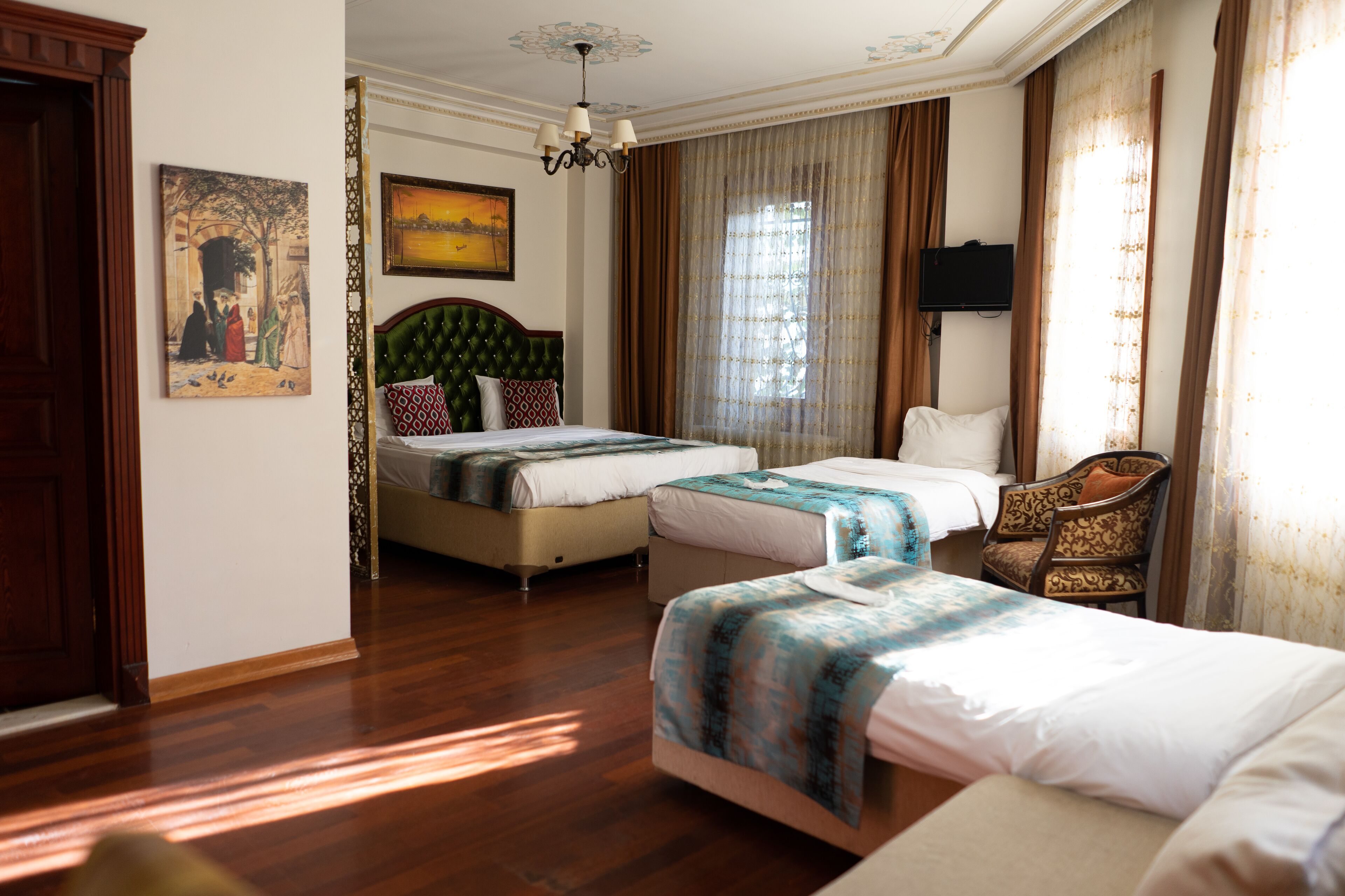 family room | premium bedding, minibar, in-room safe, individually decorated