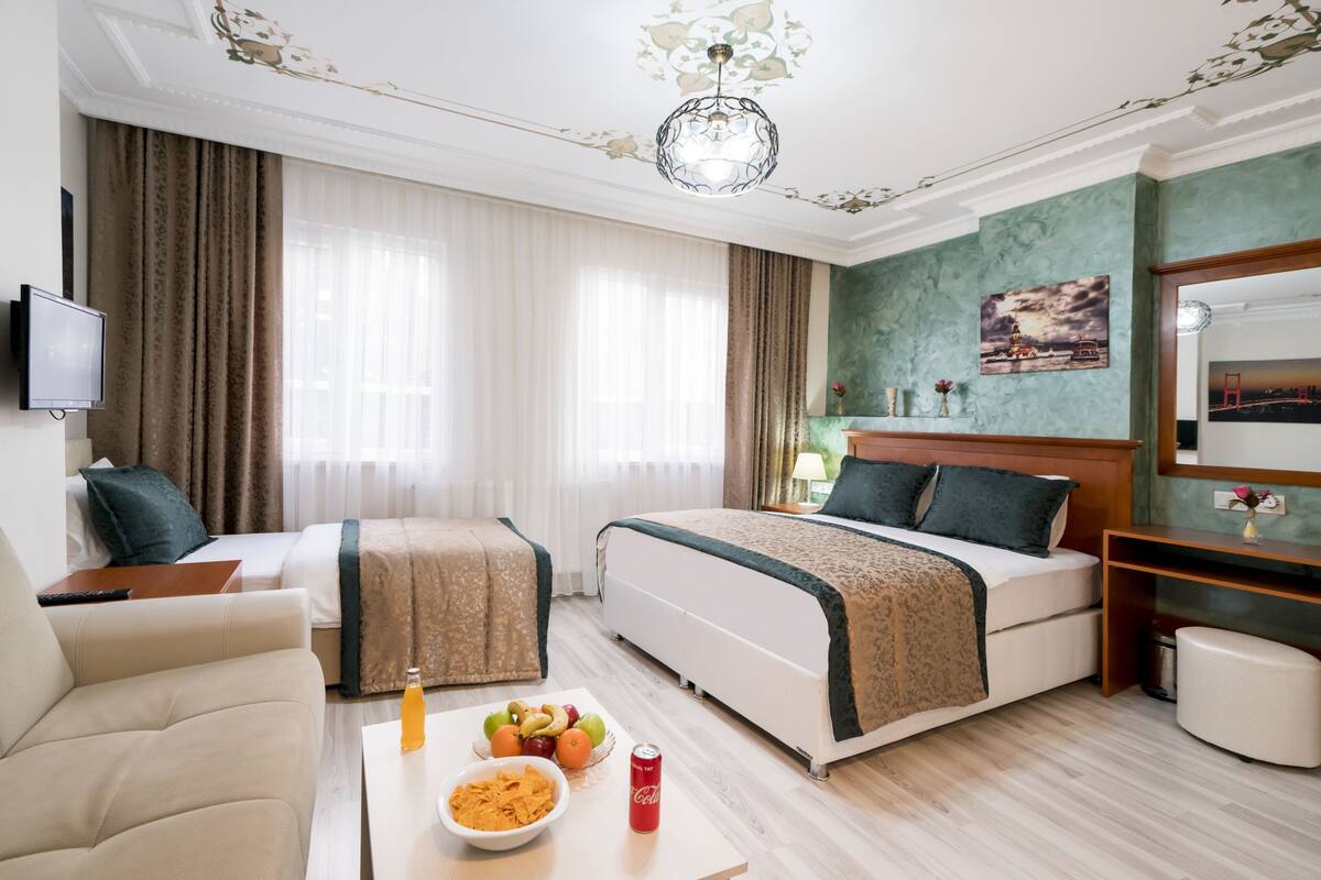 Chambre Quadruple Familiale | Literie de qualité supérieure, minibar, coffres-forts dans les chambres