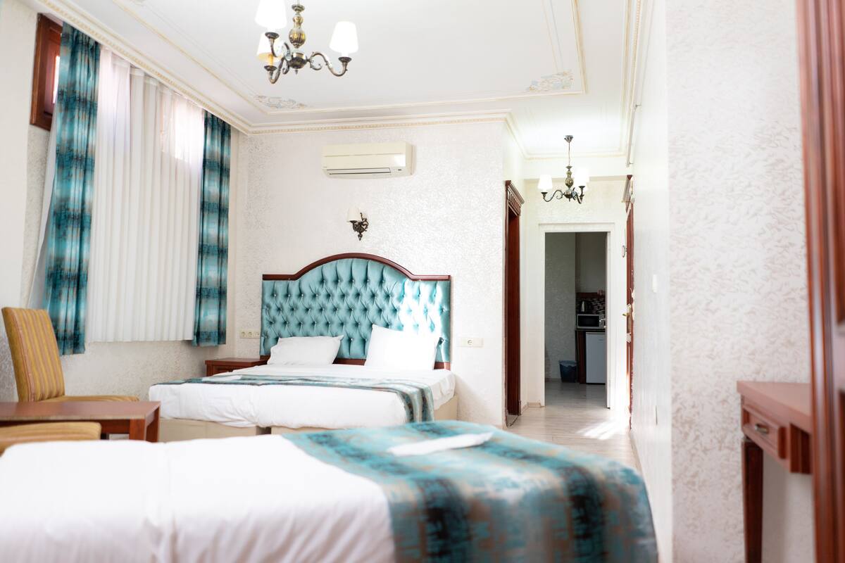Chambre avec lits jumeaux, 2 chambres | Literie de qualité supérieure, minibar, coffres-forts dans les chambres