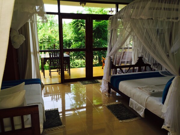 Deluxe Triple Room, 1 Bedroom, Garden View | View from room - Peacock Villa (Mirissa)