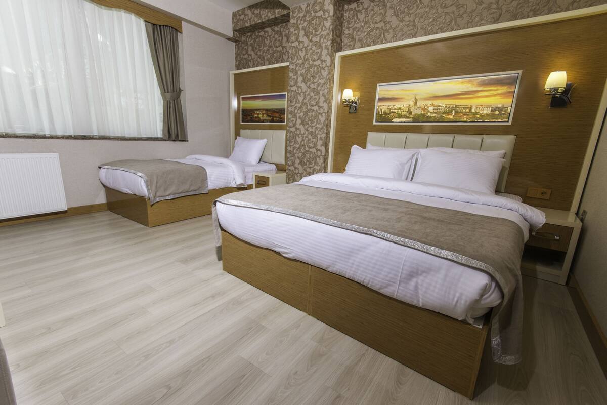 1 Schlafzimmer, hochwertige Bettwaren, Minibar, Zimmersafe