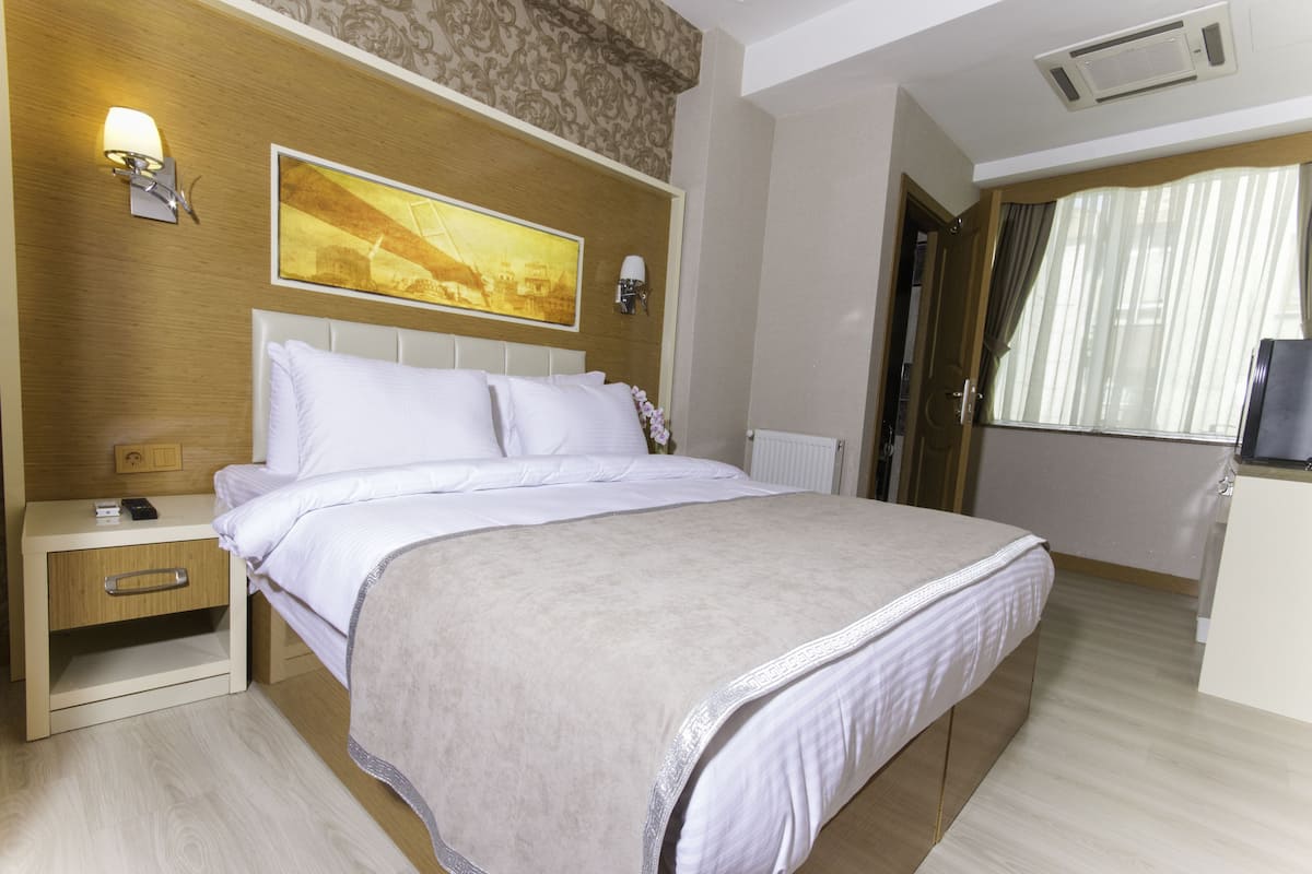1 Schlafzimmer, hochwertige Bettwaren, Minibar, Zimmersafe