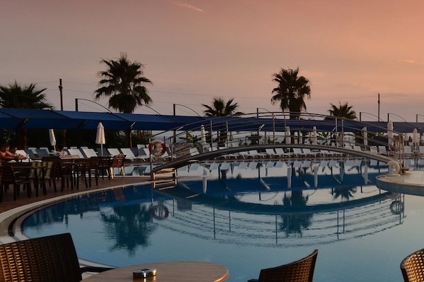 Indoor pool, 2 outdoor pools, pool umbrellas, sun loungers