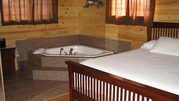 Standard Cottage, 1 Bedroom, Jetted Tub, Partial Ocean View | Iron/ironing board, free WiFi, bed sheets