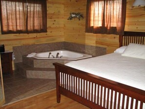 Standard Cottage, 1 Bedroom, Jetted Tub, Partial Ocean View | Iron/ironing board, free WiFi, bed sheets - Swept Away Cottages (Bayview)