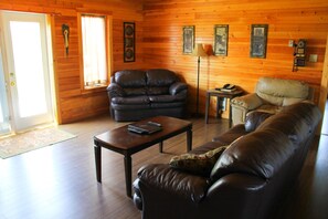 Executive Cottage, 5 Bedrooms | Living area | TV, DVD player, table tennis - Swept Away Cottages (Bayview)