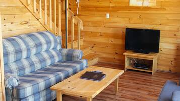Executive Cottage, 2 Bedrooms, Partial Ocean View (1 Sofa Bed) | Living room | TV, fireplace, DVD player, table tennis