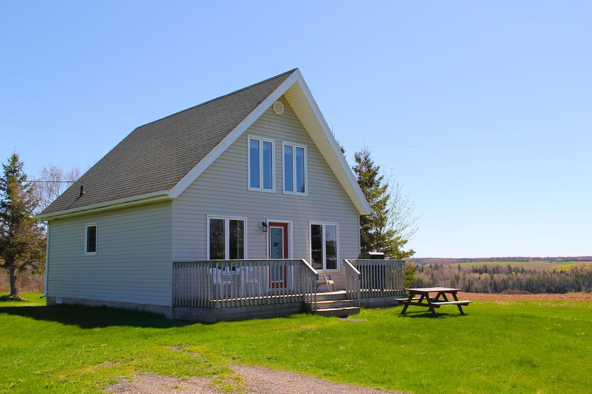 Executive Cottage, 2 Bedrooms, Partial Ocean View (1 Sofa Bed) | Iron/ironing board, WiFi (free), bed sheets