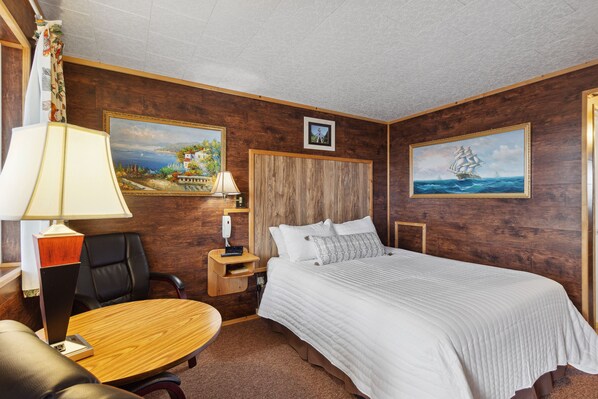 Habitación estándar, 1 cama Queen size | Escritorio, tabla de planchar con plancha, wifi gratis y ropa de cama