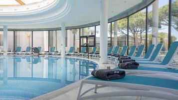 Indoor pool, 3 outdoor pools, open open 24 hours a day, pool umbrellas