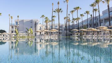 Indoor pool, 3 outdoor pools, open open 24 hours a day, pool umbrellas