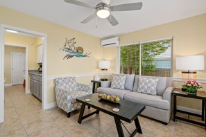 Cottage, 1 Queen Bed with Sofa bed, Kitchen (#02 Waterfront with Patio) | Living area - Bay Harbor Lodge (Key Largo)