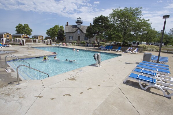 Outdoor pool, a heated pool, pool umbrellas, sun loungers
