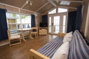 Cottage, 1 Bedroom | Living room | Flat-screen TV