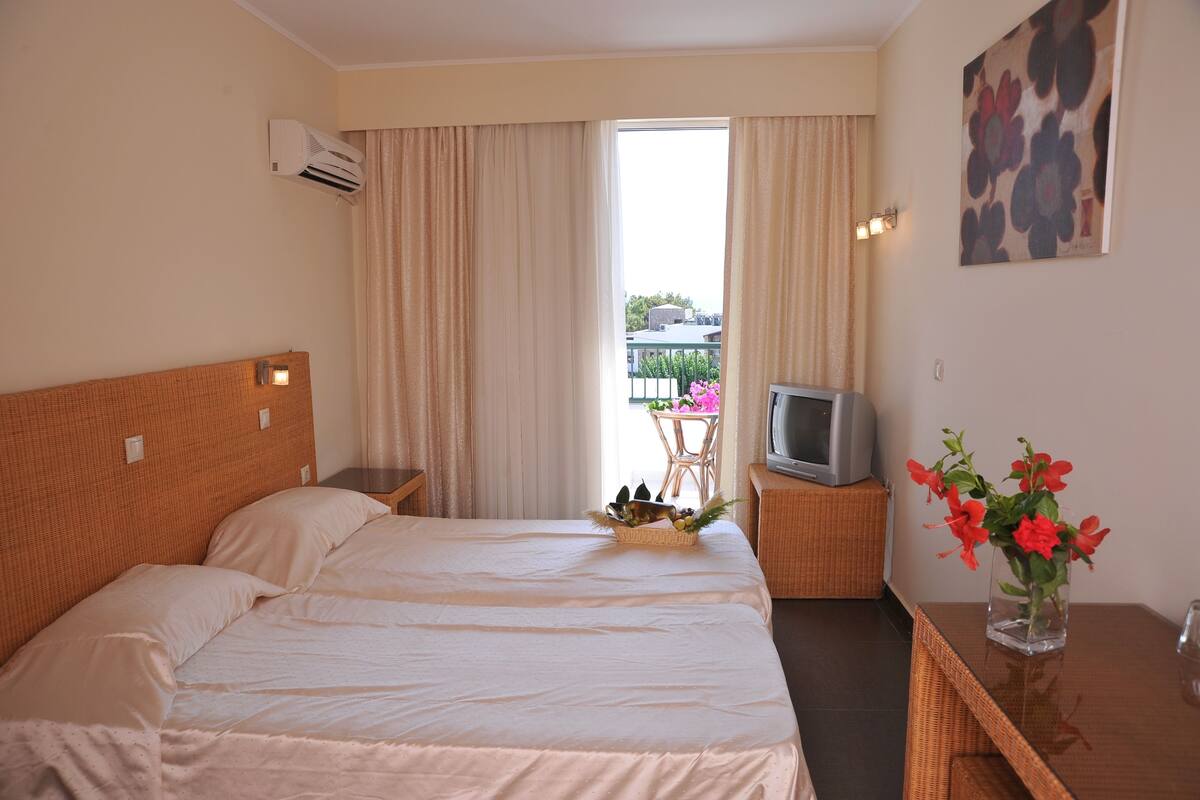Economy Room, Balcony, Garden View | Cribs (free), rollaway beds (surcharge)