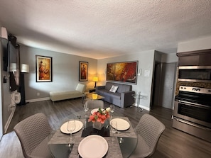 Comfort Apartment, 1 Bedroom, Kitchen, Pool View | Living area | Flat-screen TV - Sheridan Suites Apartments Hotel (Dania Beach)