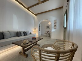 Signature Villa, Annex Building | Living area | TV, books