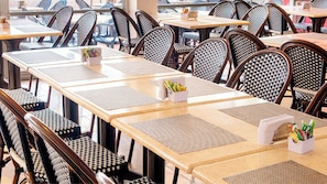 Enjoy meals and work sessions in a well-designed dining area with comfortable seating and practical amenities.