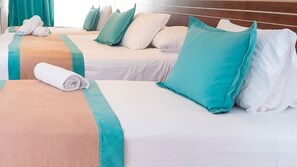 Triple Room | Bed sheets - Hotel Portobelo Convention Center (San Andrés)
