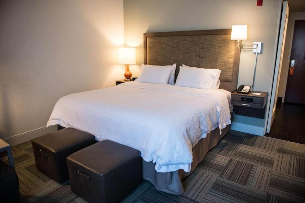 Down duvets, pillow-top beds, in-room safe, blackout curtains