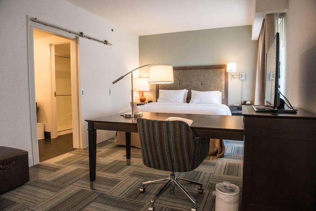 Down duvets, pillow-top beds, in-room safe, blackout curtains