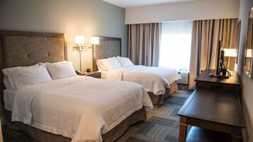 Down duvets, pillow-top beds, in-room safe, blackout curtains