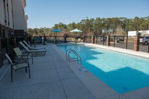 Outdoor pool, open 7 AM to 10 PM, pool umbrellas, sun loungers