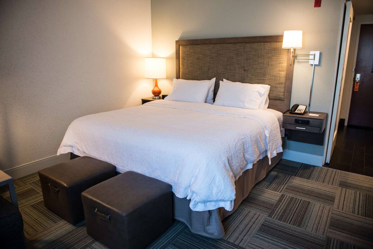 Down duvets, pillow-top beds, in-room safe, blackout curtains