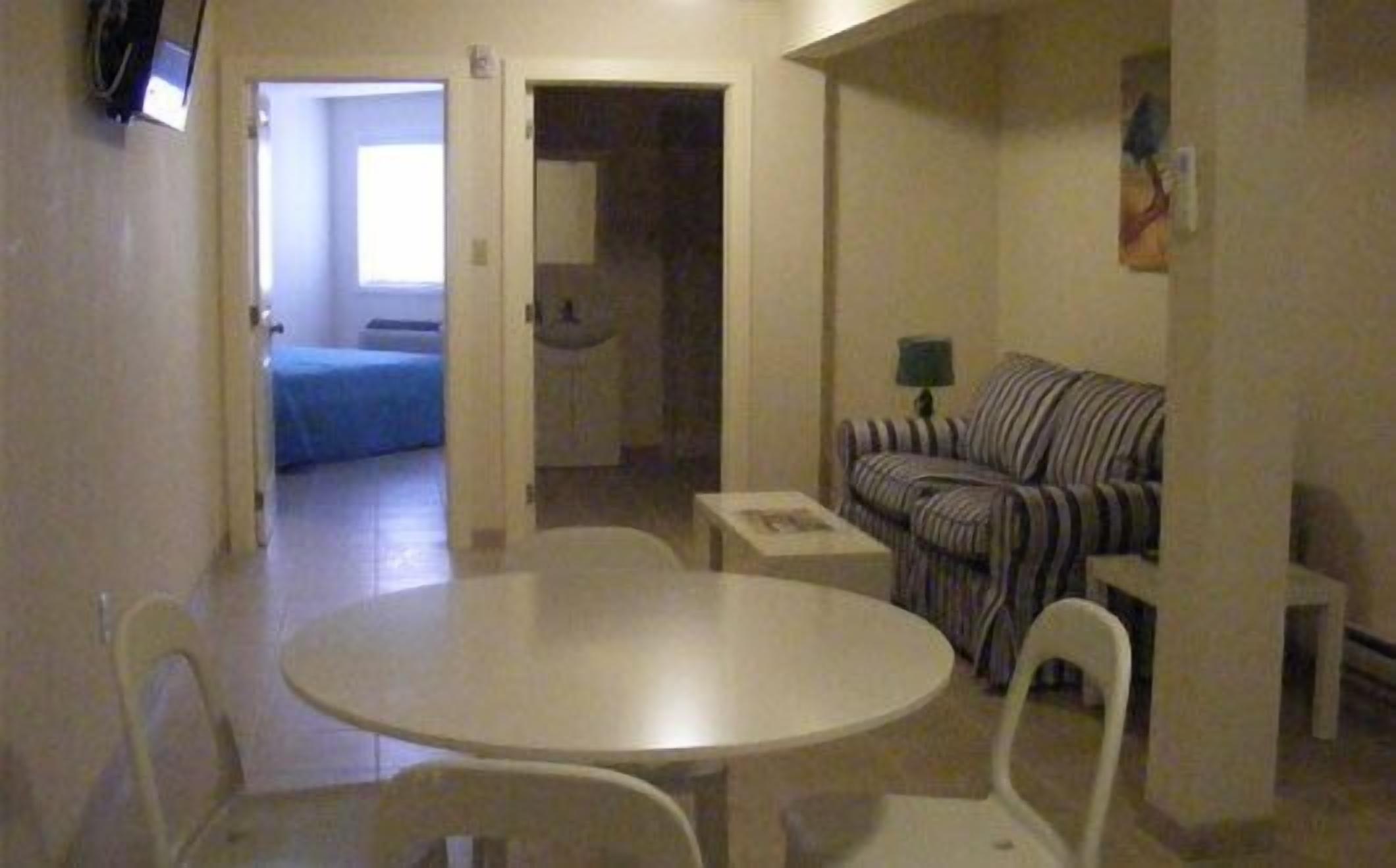 Deluxe Suite, 1 Queen Bed with Sofa bed, Kitchen | Living area