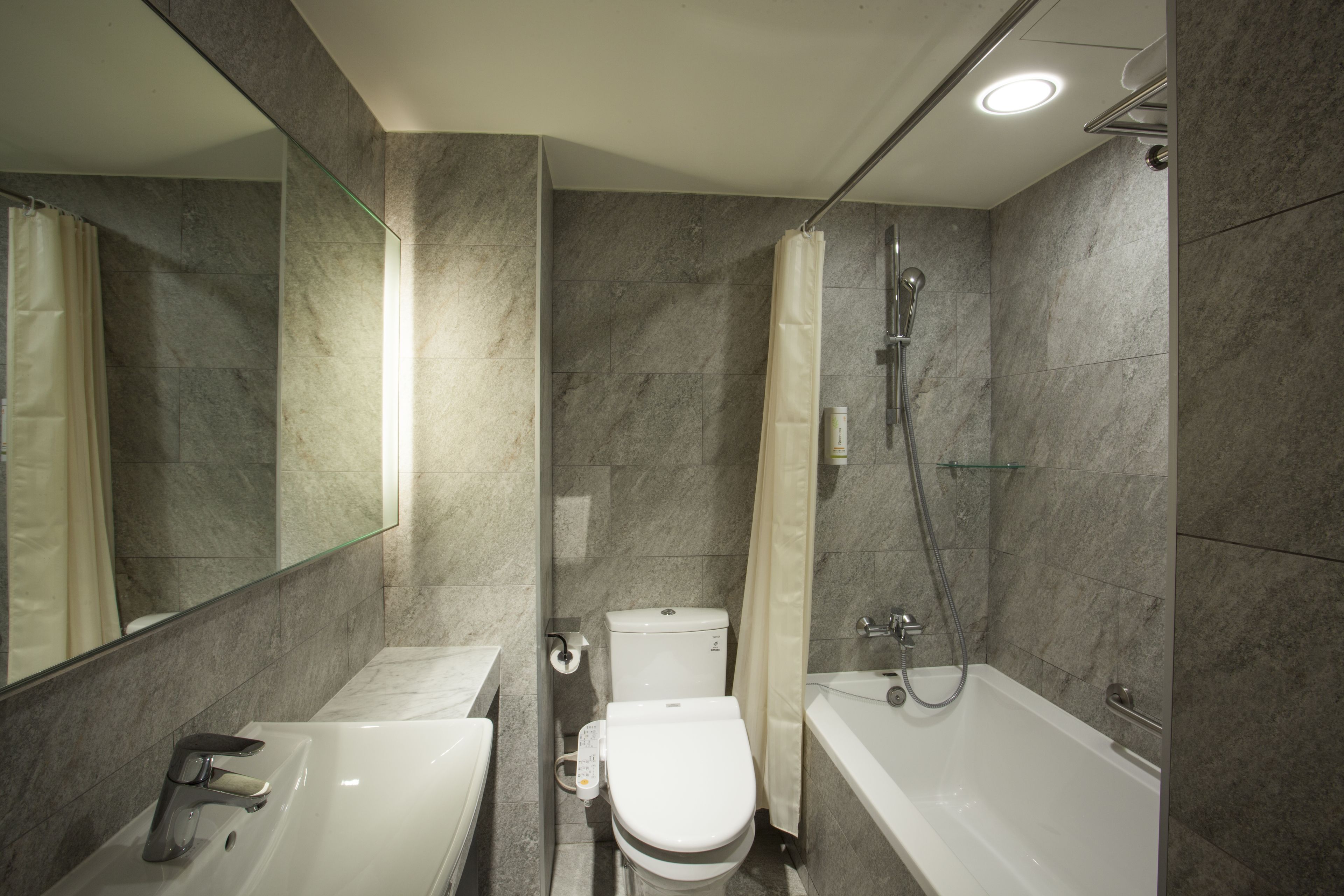 luxury triple room | bathroom | free toiletries, hair dryer, slippers, bidet