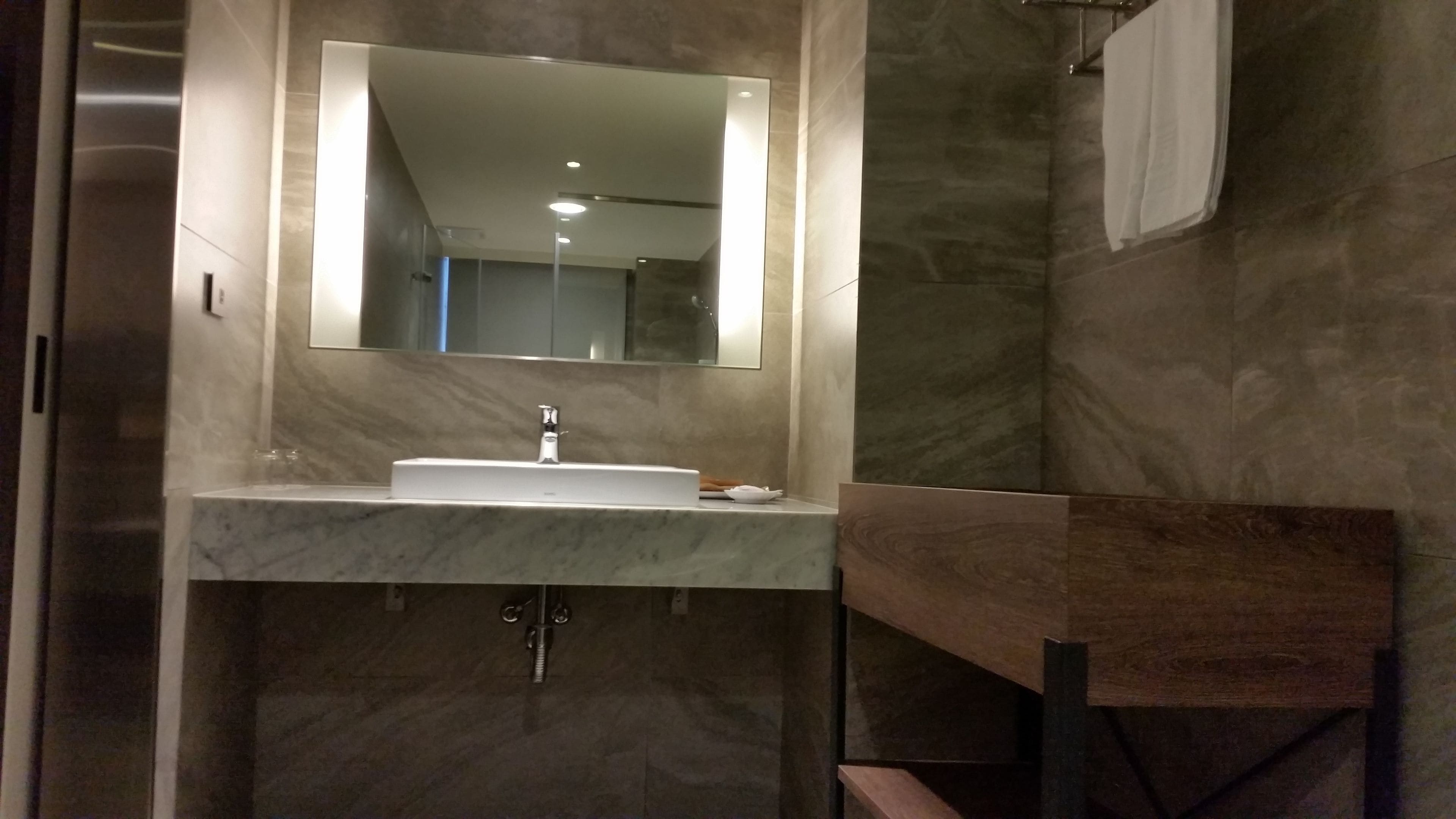 deluxe room, 1 queen bed (vip) | bathroom | free toiletries, hair dryer, slippers, bidet