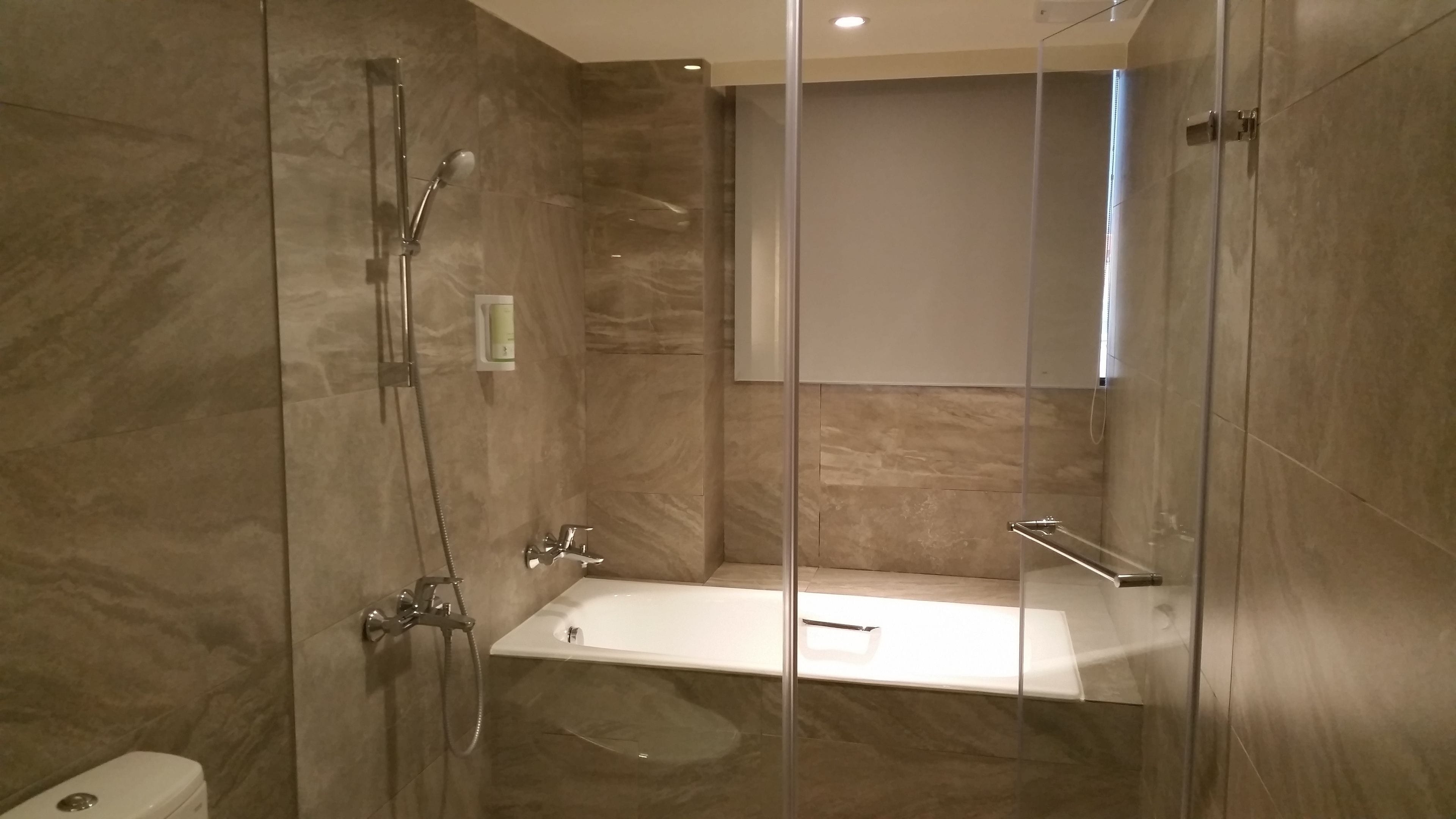 deluxe room, 1 queen bed (vip) | bathroom | free toiletries, hair dryer, slippers, bidet