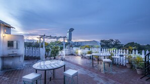 Outdoor dining - Aishwarya Suites (Mysore)