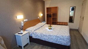 Premium bedding, desk, iron/ironing board, rollaway beds