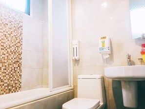 Quadruple Room, City View | Bathroom | Combined shower/tub, deep soaking tub, free toiletries, hair dryer