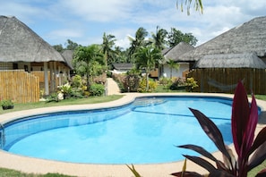 2 outdoor pools, pool umbrellas, pool loungers
