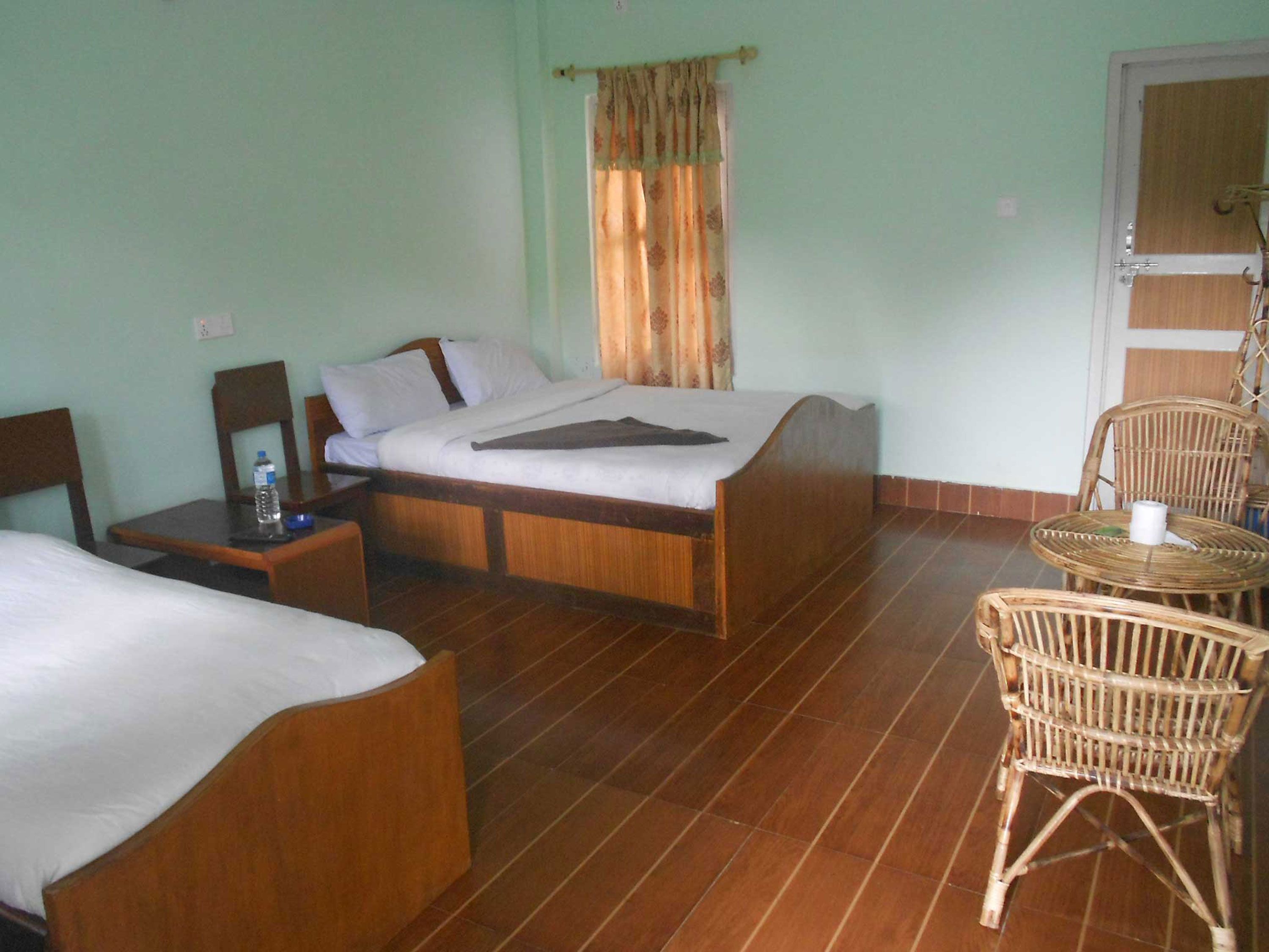 Camera Basic con letto matrimoniale o 2 letti singoli, bagno privato, vista giardino | Una cassaforte in camera, Wi-Fi gratuito