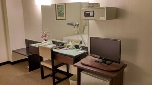 Luxe beddengoed, een minibar, een kluis op de kamer, een bureau