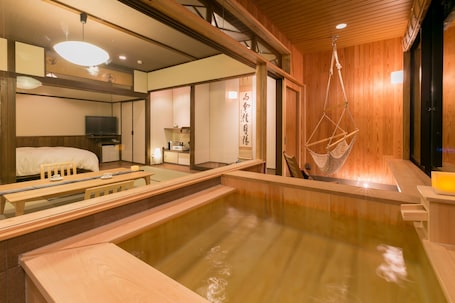 Double Room with Tatami Area and Hot Spring Bath - Ran | Bathroom | Free toiletries, hair dryer, electronic bidet, towels
