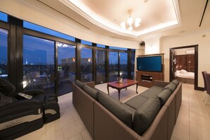 71sq m, Executive Suite, Non Smoking | Living area | 50-inch LCD TV with satellite channels, DVD player, first-run movies